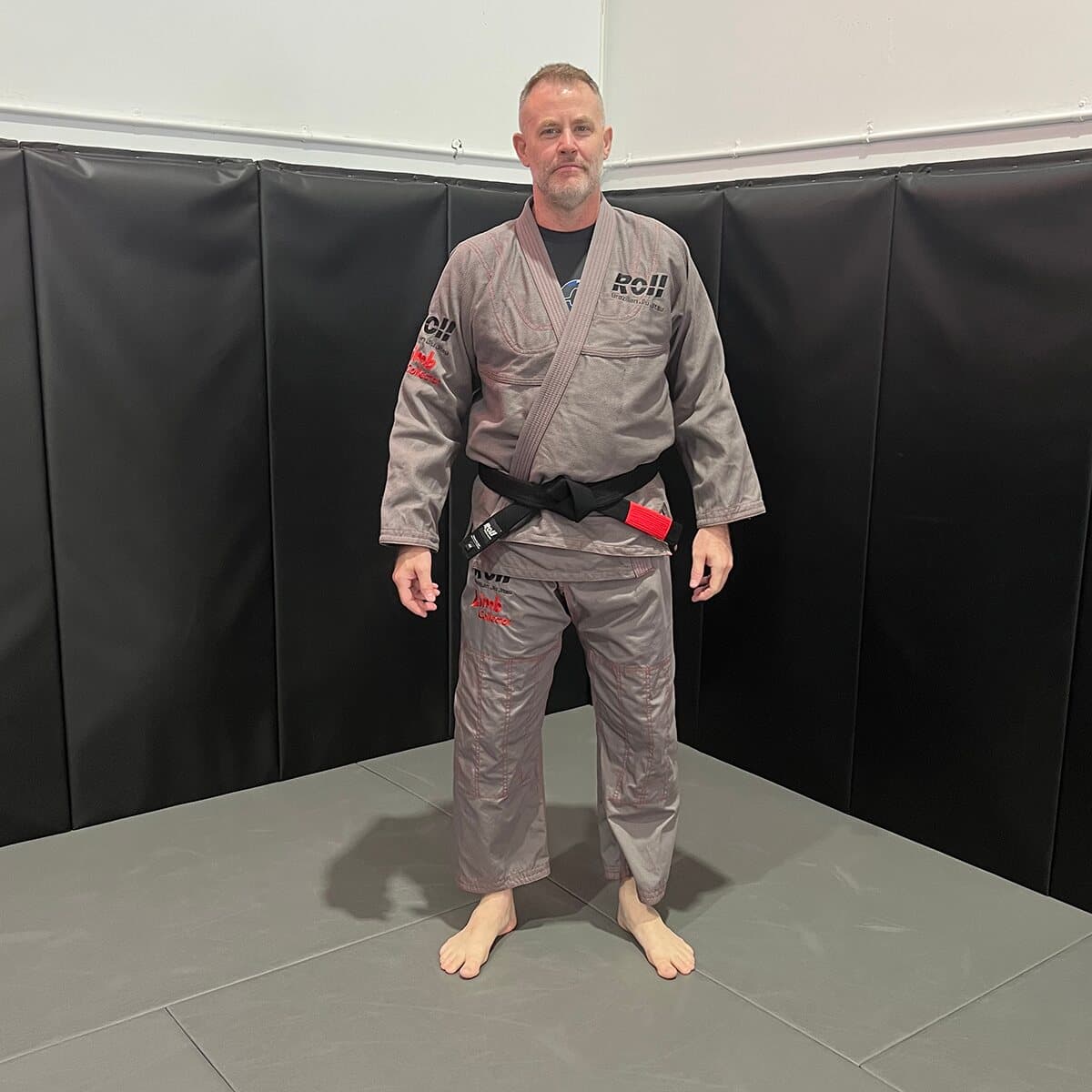 Limb Collector gi worn, front view on the mats